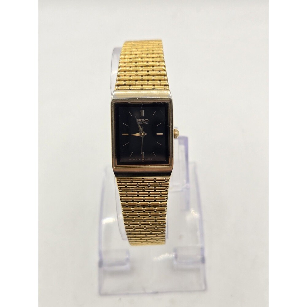 Vintage Seiko Ladies' 18.5mm Black Dial Gold Tone Tank Watch. 2Y01-51DH. New Bat